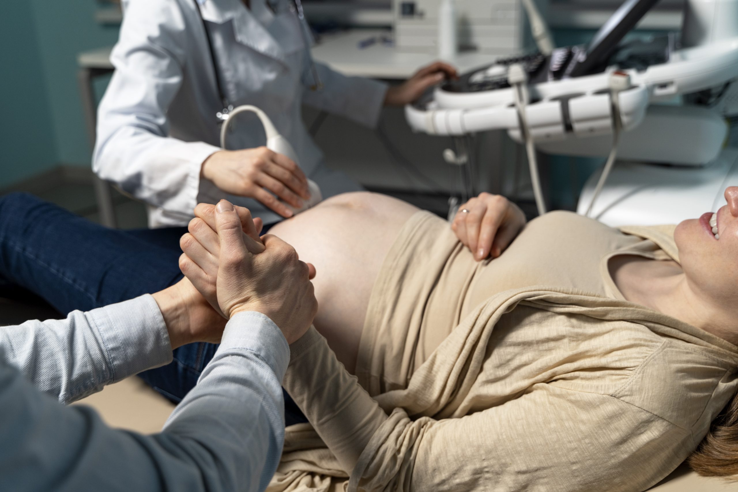 woman getting ultrasaound consultation with doctor